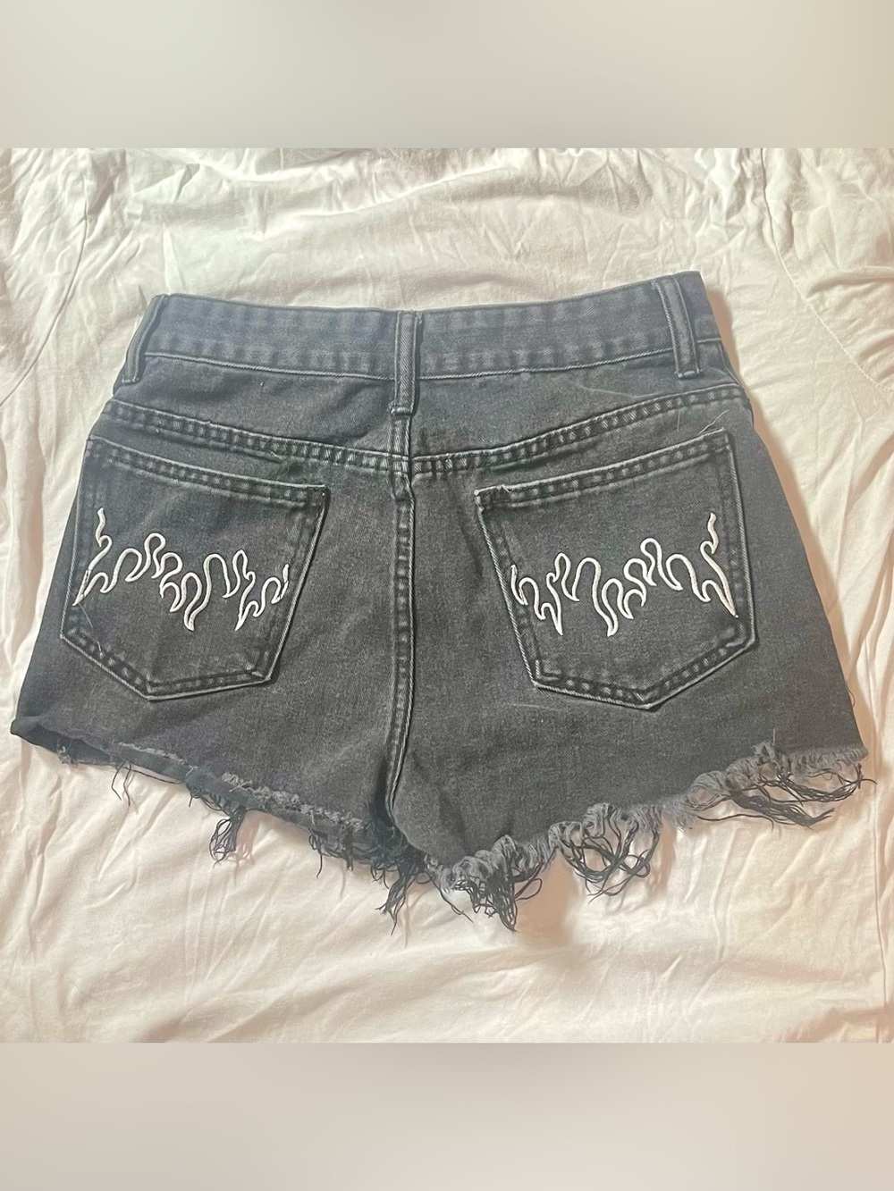 SHEIN Black Denim Cutoff Shorts with White Flame Pocket Embroidery